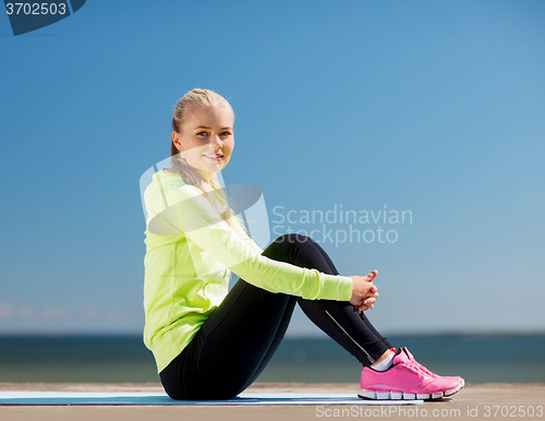 Image of woman doing sports outdoors