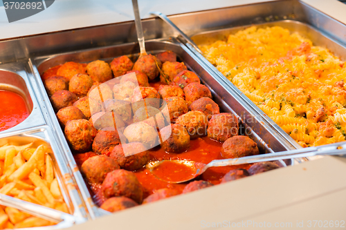 Image of close up of meatballs and other dishes on tray