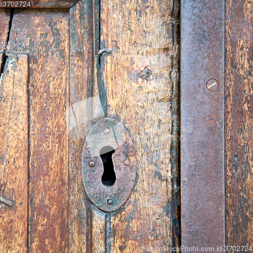 Image of  traditional   door    in italy   ancian wood and traditional  t