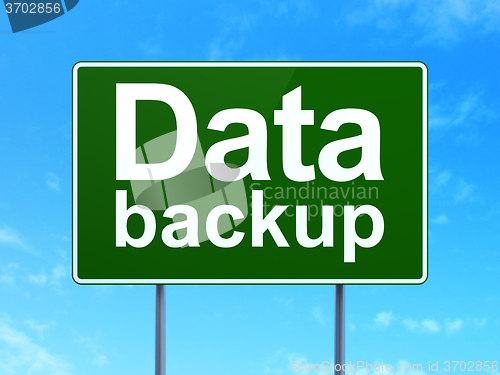 Image of Data concept: Data Backup on road sign background