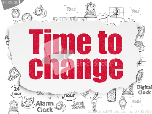 Image of Time concept: Time to Change on Torn Paper background