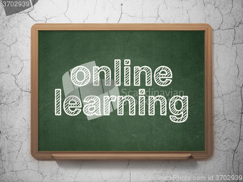 Image of Learning concept: Online Learning on chalkboard background