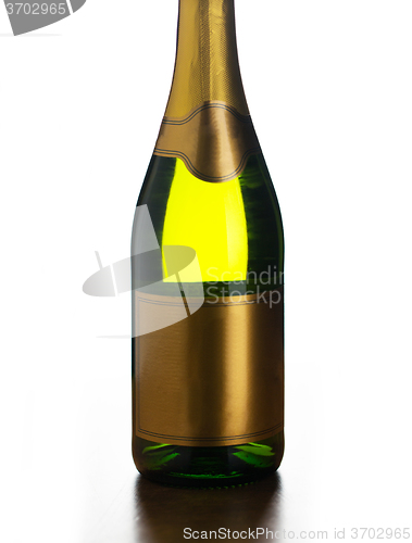 Image of close up of champagne bottle with blank label