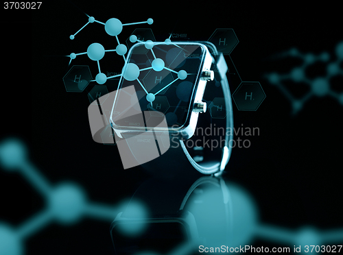 Image of close up of smart watch over hydrogen formulas