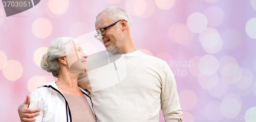 Image of happy senior couple looking at each other