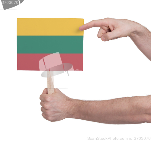 Image of Hand holding small card - Flag of Lithuania