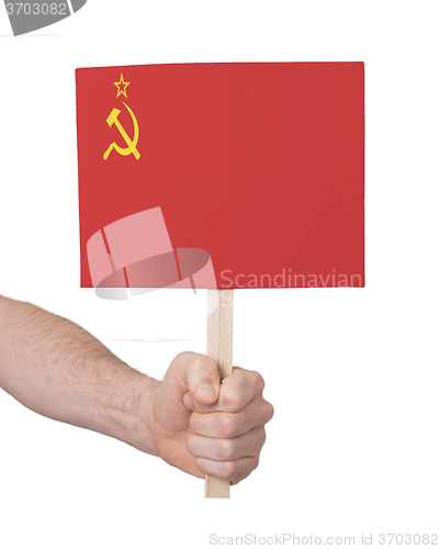 Image of Hand holding small card - Flag of the USSR