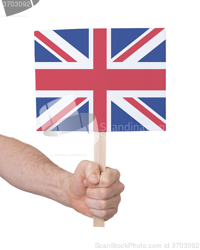 Image of Hand holding small card - Flag of the UK