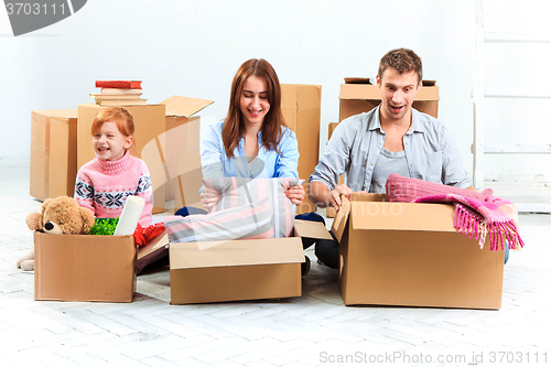 Image of The happy family  at repair and relocation