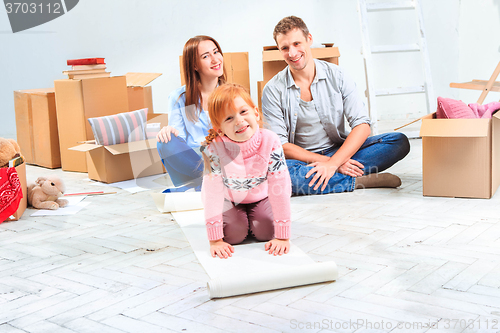 Image of The happy family  at repair and relocation