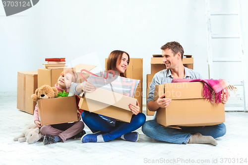 Image of The happy family  at repair and relocation