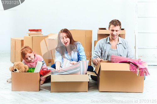 Image of The happy family  at repair and relocation