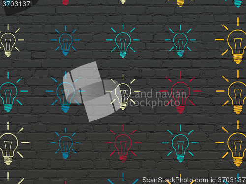 Image of Finance concept: Light Bulb icons on wall background