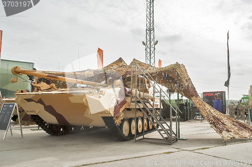 Image of Tracked repair vehicle RMG under camouflage net