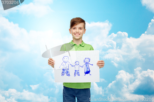 Image of happy boy holding drawing or picture of family