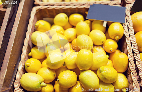 Image of ripe lemons at food market