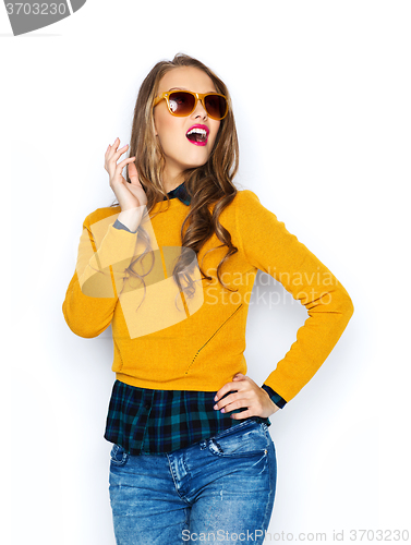 Image of happy young woman or teen girl in casual clothes