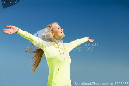 Image of woman doing sports outdoors
