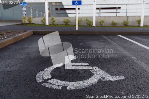 Image of car parking road sign for disabled outdoors