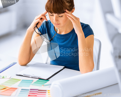 Image of stressed interior designer