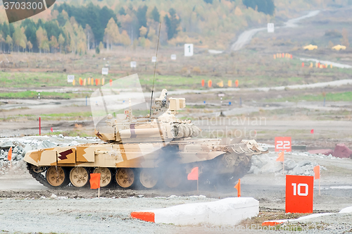 Image of Tank T-90S moves with turret turned back