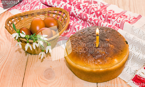 Image of Easter cake and Easter eggs red.