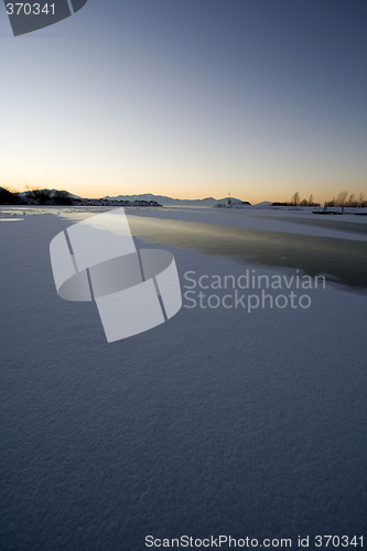 Image of Sunrise over the Frozen Lake