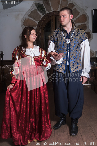 Image of Pretty couple in medieval era costumes