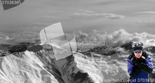 Image of Panoramic view on winter mountains in clouds