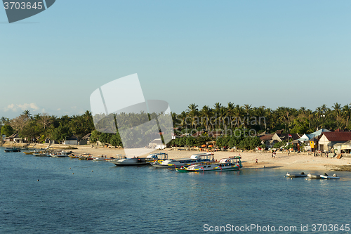 Image of sand beach with boat, Bali Indonesia