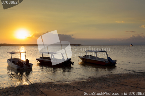 Image of Nusa penida, Bali beach with dramatic sky and sunset