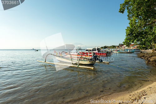 Image of sand beach with boat, Bali Indonesia