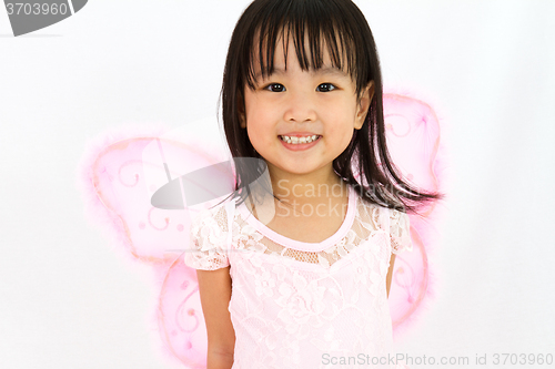 Image of Chinese little girl wearing butterfly custome