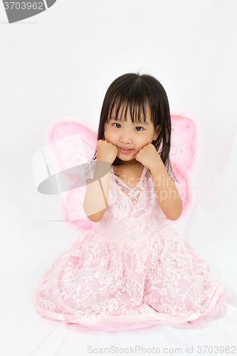 Image of Chinese little girl wearing butterfly custome