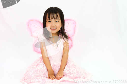 Image of Chinese little girl wearing butterfly custome