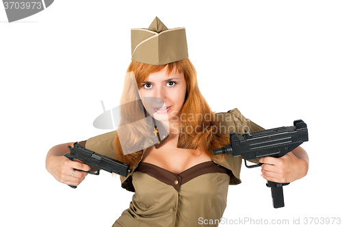 Image of beautiful woman in military uniform with weapon