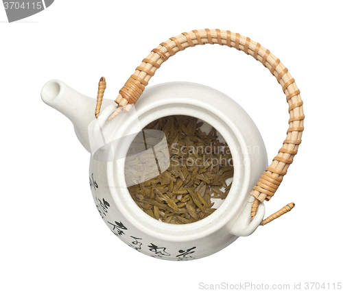 Image of Teapot with chinese tea leaves