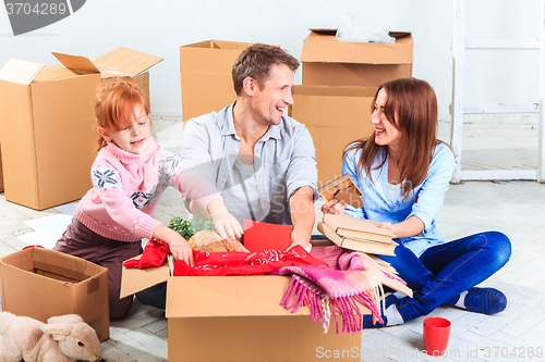 Image of The happy family  at repair and relocation