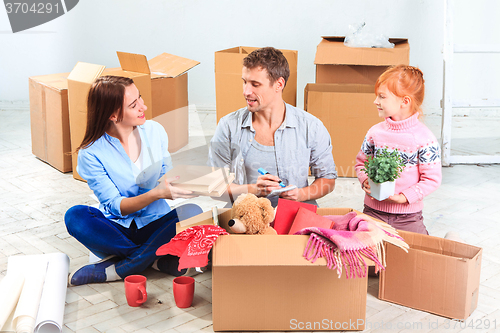 Image of The happy family  at repair and relocation