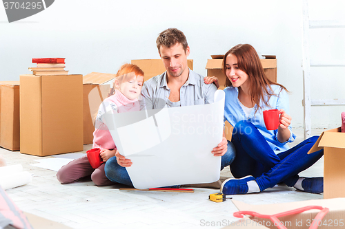 Image of The happy family  at repair and relocation