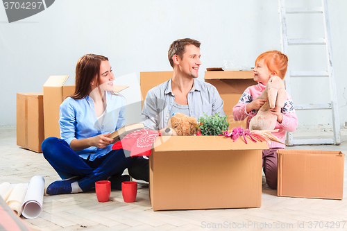 Image of The happy family  at repair and relocation