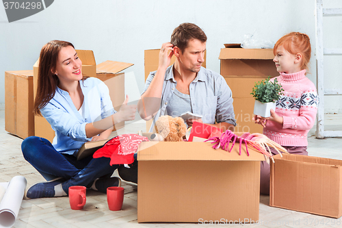 Image of The happy family  at repair and relocation