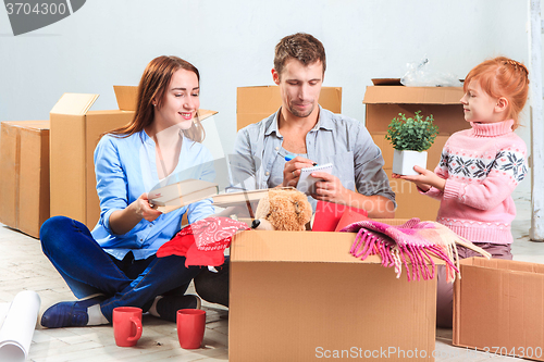 Image of The happy family  at repair and relocation