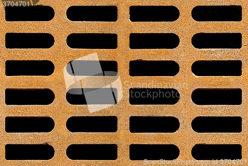 Image of Rusty drain grate seamless background texture