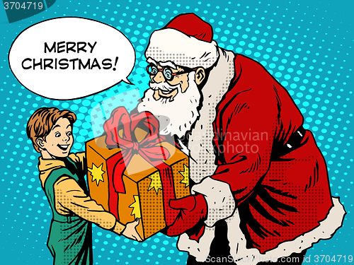 Image of Merry Christmas Santa Claus gift gives the child