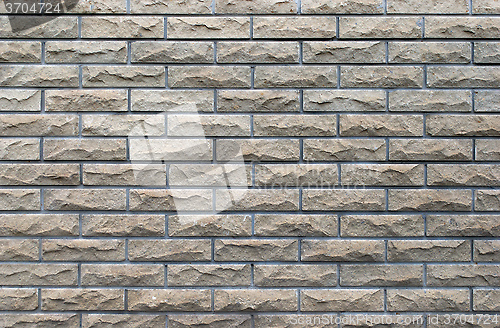 Image of brick wall with a seam