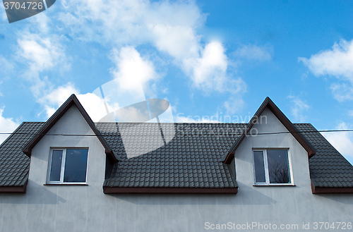 Image of house roof two floors