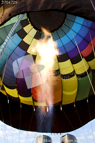 Image of Flames from a burner inside a hot-air balloon envelop