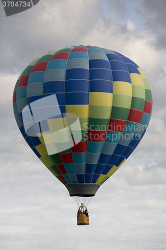 Image of Hot-air Balloon Floating Among Clouds