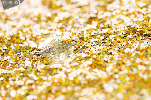 Image of golden glitter or yellow sequins background